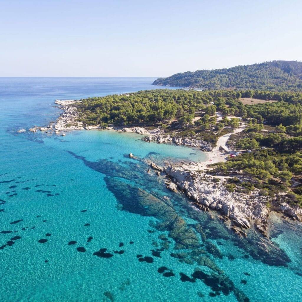 Custom Private Boat and Cruise Tours in Tranquil bay, emerald waters, whispering pines, untouched beauty, nature’s gentle embrace.